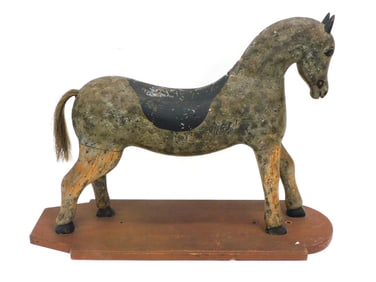 Carved Wooden Horse on Board