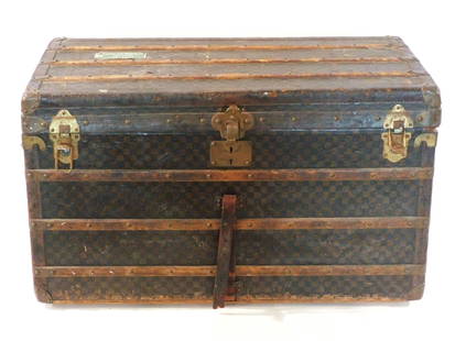 Vintage Louis Vuitton Steamer Trunk: Late 19th C. Serial number 116845. Signed inside: "Louis Vuitton, Paris, 454 Strand, London". Latch and handles also signed. Black top. Checkered canvas cover. Fitted with one tray. Quilted interior.
