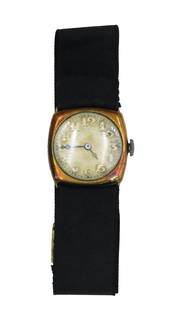 Gold Wrist Watch: Ca. 1920s. On a black Petersham ribbon band with gold fastenings. 14kt. In old fitted Gruen box. Please note this lot must be paid for by cash, wire transfer or known check. Items will be shipped or s