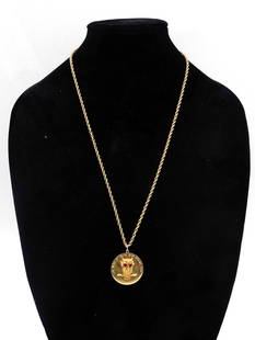 Gold Owl Pendant on Chain: Reads "Je n'ai d'yeux que pour toi", or "I only have eyes for you". 26" chain. 14kt pendant and chain. 18.65 dwt. Please note this lot must be paid for by cash, wire transfer or known check. Items wil