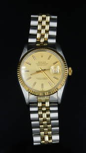 Vintage Men's Rolex Watch: Stainless steel and 14kt gold. Oyster perpetual Datejust. Rolex strap. Please note this lot must be paid for by cash, wire transfer or known check. Items will be shipped or sent to shipper once paymen