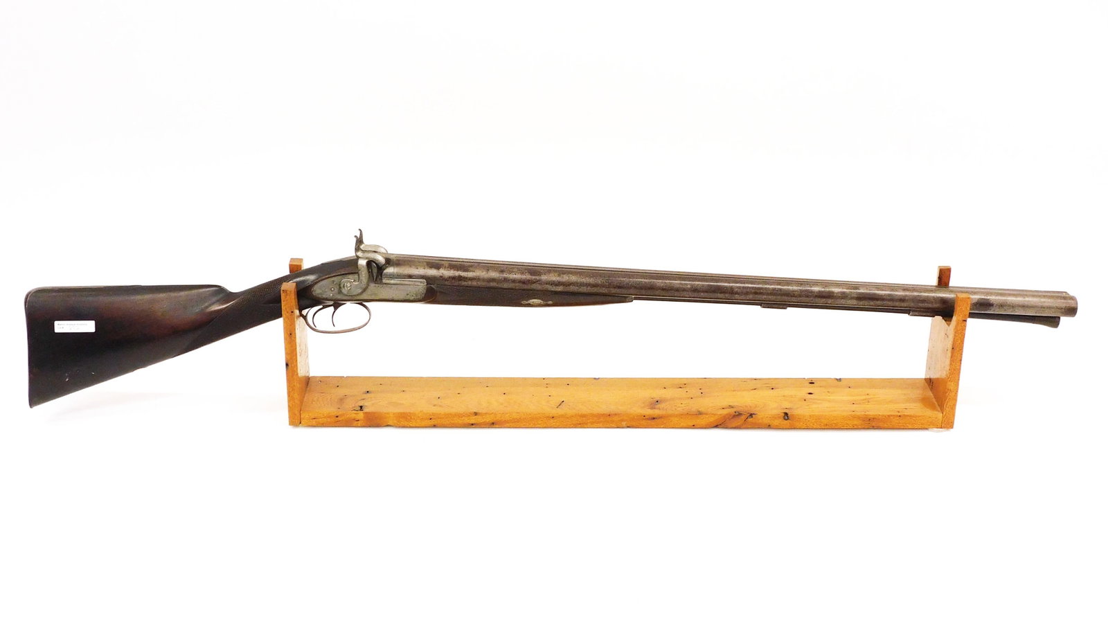 Moore & Harris Percussion Shotgun: 19th C. London. Damascus double barrel. Engraved locks & trigger guard. Checkered forestock. Muzzle loading. Large bore. #2225. 46" long. Provenance: From the estate of William Savery, Carver, Massach