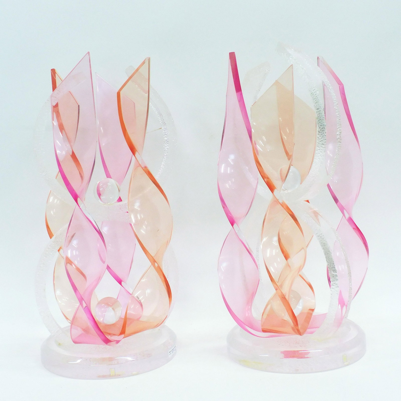 A Pair Of Shlomi Haziza Sculptures: Late 20th century. A pair of acrylic sculptures. 21 1/2" high x 10 3/4" diameter.