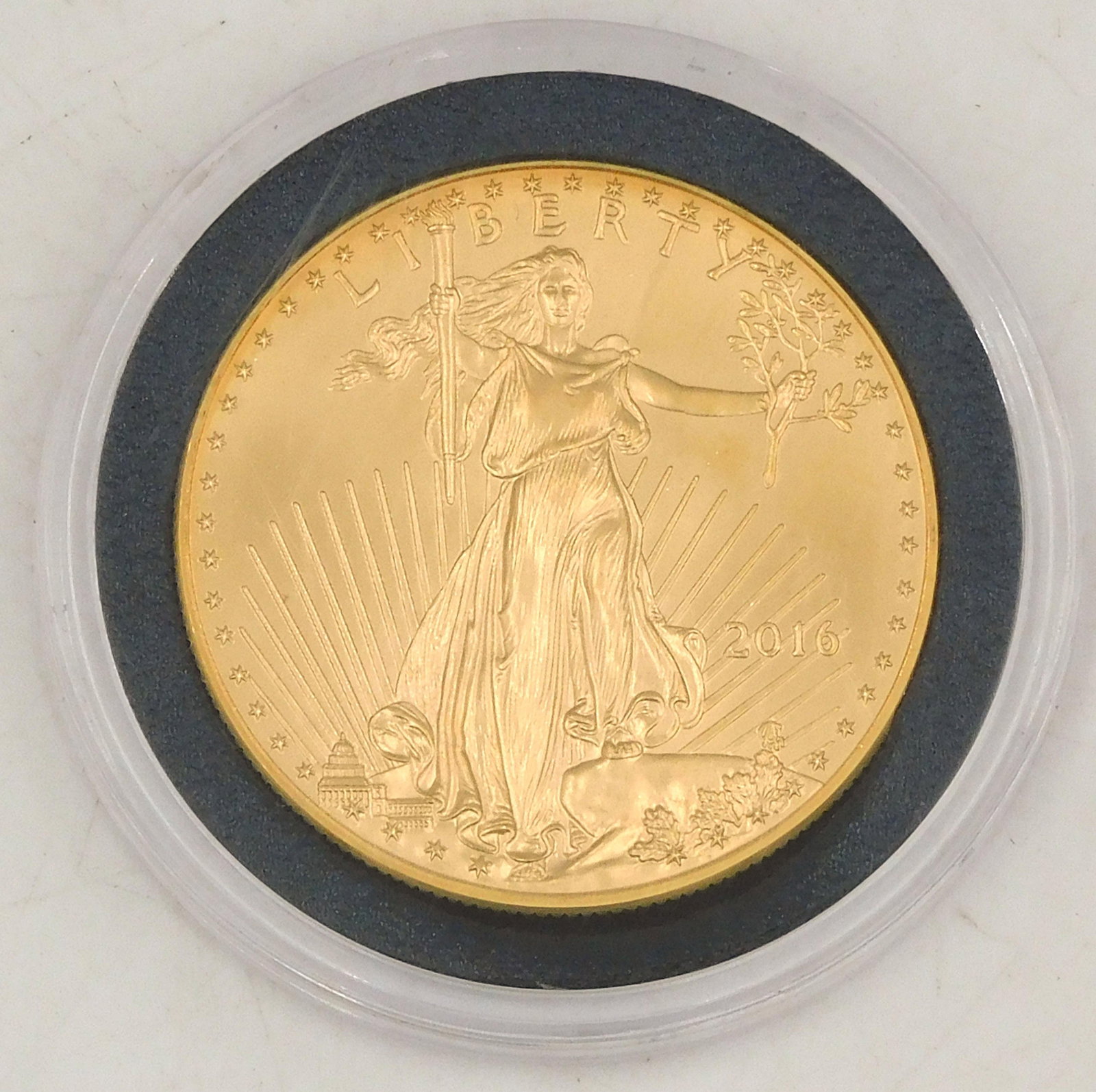 2016 $50 Gold Eagle Coin: 1 ounce fine gold. Please note this lot will not be available for in-person viewing. Please note this lot must be paid for by cash, wire transfer or known check. Items will be shipped or sent to shipp