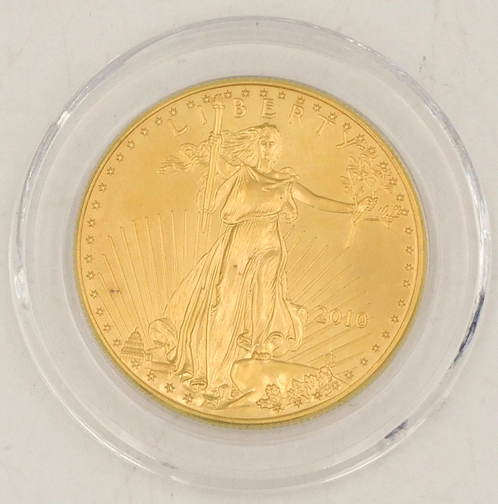 2010 $50 Gold Eagle Coin: 1 ounce fine gold. Please note this lot will not be available for in-person viewing. Please note this lot must be paid for by cash, wire transfer or known check. Items will be shipped or sent to shipp