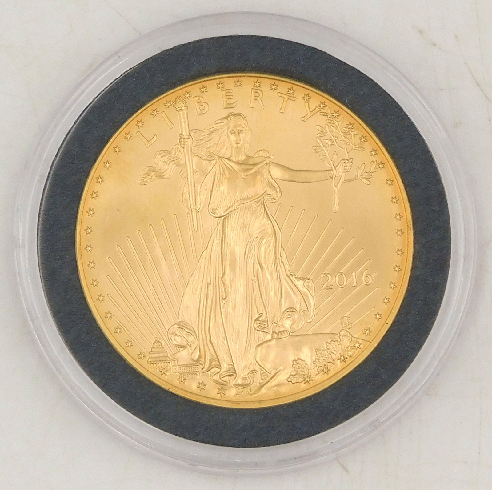 2016 $50 Gold Eagle Coin: 1 ounce fine gold. Please note this lot will not be available for in-person viewing. Please note this lot must be paid for by cash, wire transfer or known check. Items will be shipped or sent to shipp