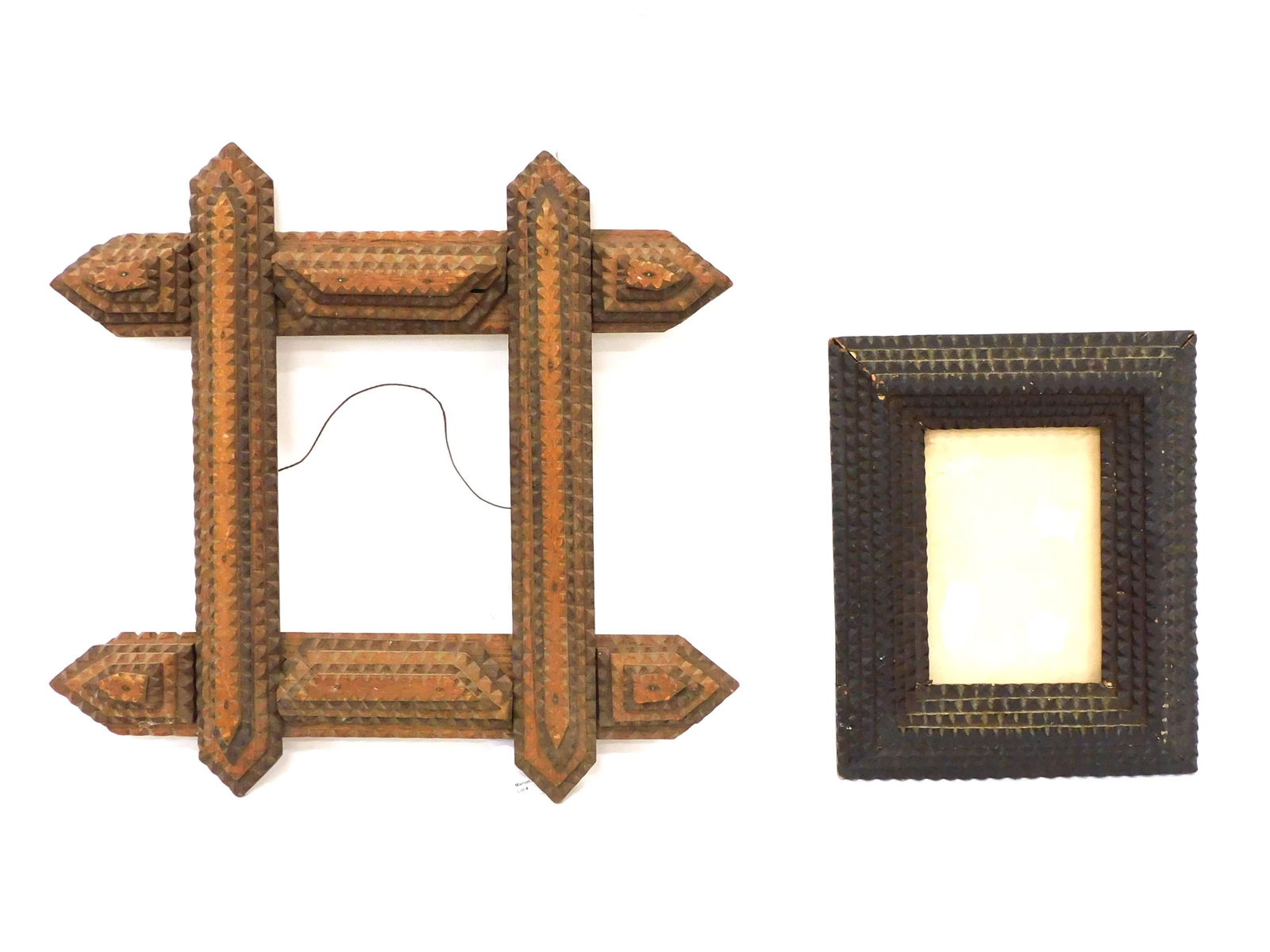 (2) Tramp Art Frames: Late 19th C. To include: (A) 15 1/2" high x 14 1/2" wide x 2" deep. (B) 11" high x 8" wide x 1 1/4" deep.