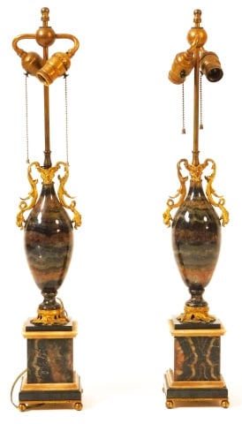 Pair of Blue John/Derbyshire Spar Urn Lamps: Late 18th/Early 19th C. Regency style. Possibly candelabras converted to lamps. Two light sockets. Brass ormolu mounts with slate and marble highlights. Overall 28" high. Base is 18" high. No shades.