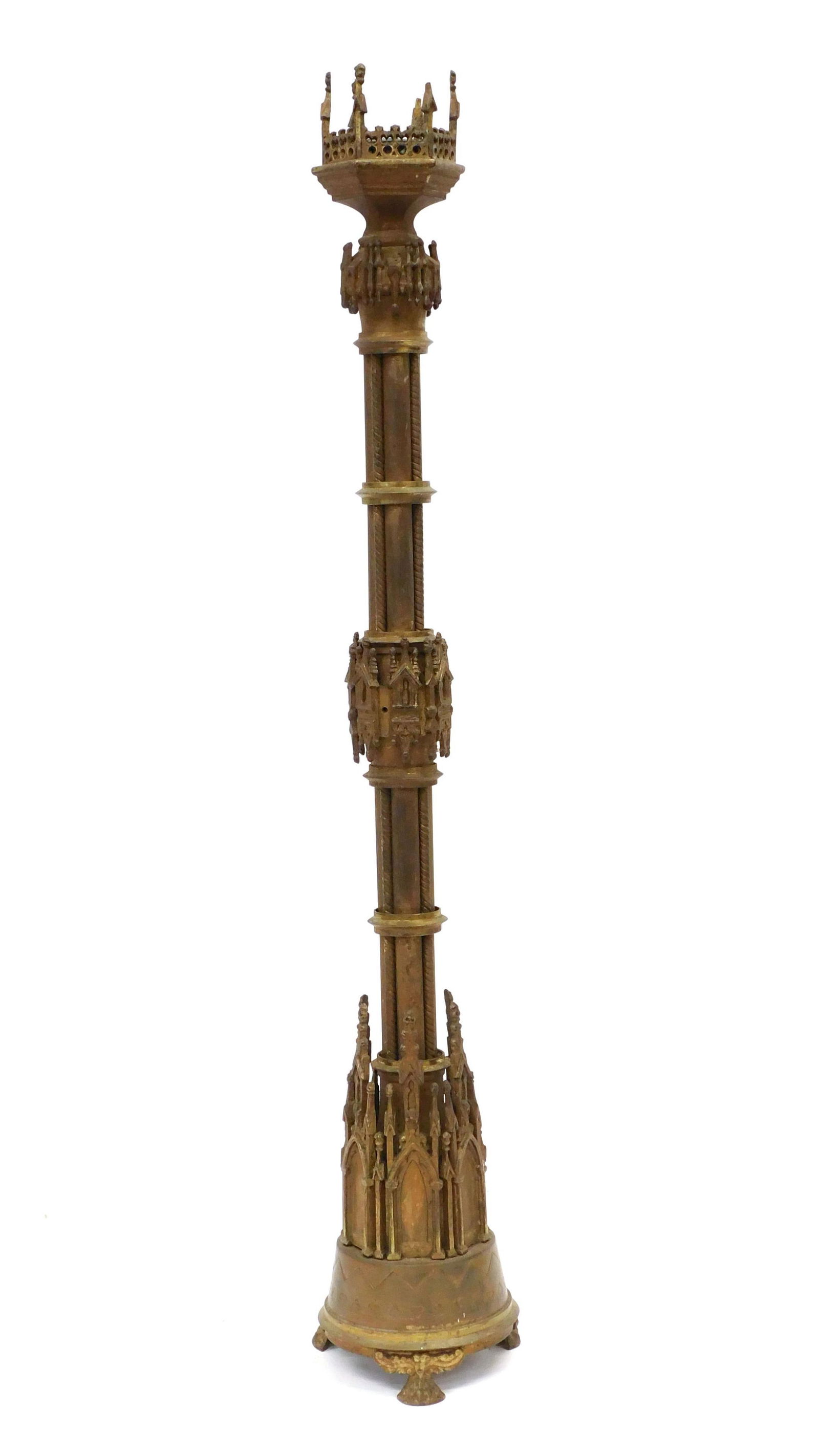 Brass Candlestick: 19th C. Ornate ecclesiastical design. Claw feet. 30" high x 5 1/2" diameter at base. Provenance: From the estate of Rodney Hilton Brown.