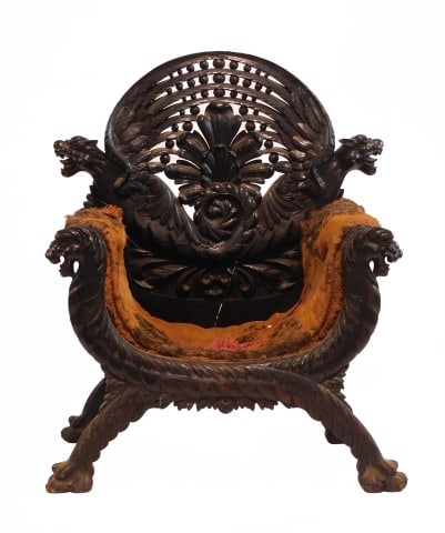 American Oak Winged Griffin Throne Chair: Late 19th C. Victorian carved chair in the Horner style. Horse hair tufting. 47 1/2" high x 39 3/4" wide x 26 1/2" deep. 13 1/2" seat height.
