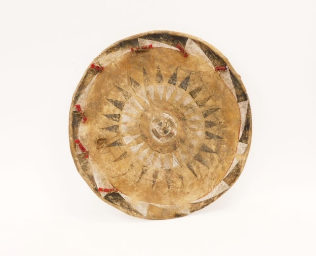 Apache Dance Shield: Early 20th C. Geometric painted design on hide. 20" diameter.