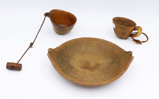 (3) Pieces Woodlands Woodenware: 19th C. To include: (A) Bowl with carved handles. 2" high x 8 3/4" wide x 7 1/4" deep. (B) Cup with fish effigy handle. 2 1/4" high x 3 7/8" wide. (C) Burl belt cup. 2 1/2" high x 3 1/2" wide.