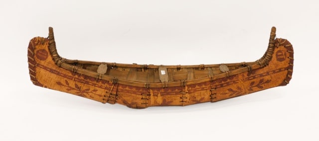 Great Lakes Birch Bark Canoe: Mid-/Late-20th C. Woven birch bark with pained geometric leaf design. 11" high x 35 1/4" wide x 8 3/4" deep.