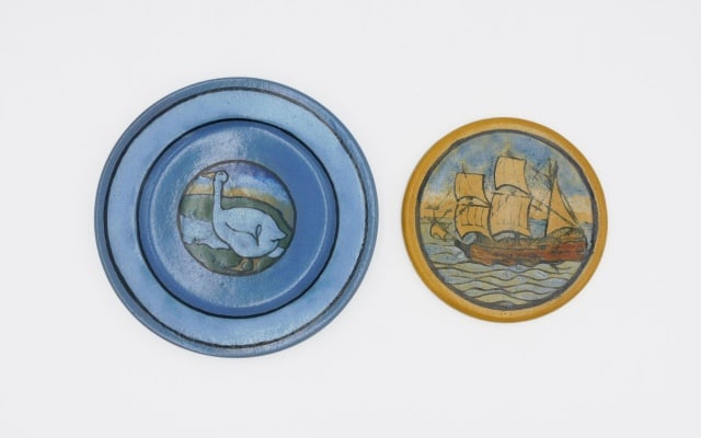 (2) Paul Revere Pottery Pieces: Early 20th C. To include: (A) Plate depicting a goose. 7 3/4" diameter. Original paper label as well as signature on verso. (B) Trivet featuring a ship under sail. 5 3/4" diameter. Original paper labe