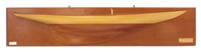 Wooden Half Hull: 20th C. Mounted cedar. Ten meter sloop by Burgess and Donaldson. Marked on verso "Dorman". 9 3/8" high x 46 3/4" wide. Provenance: From the estate of Rodney Hilton Brown.
