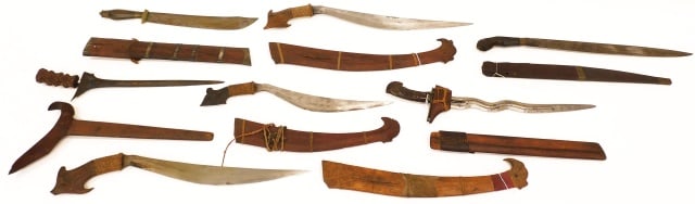 (7) South Pacific Knives with Sheaves: Late 19th/early 20th C. Wooden sheaves. 22 1/2" to 25 1/2" long. Provenance: Property deaccessioned from the Old Dartmouth Historical Society, New Bedford, Massachusetts. Proceeds to benefit the colle
