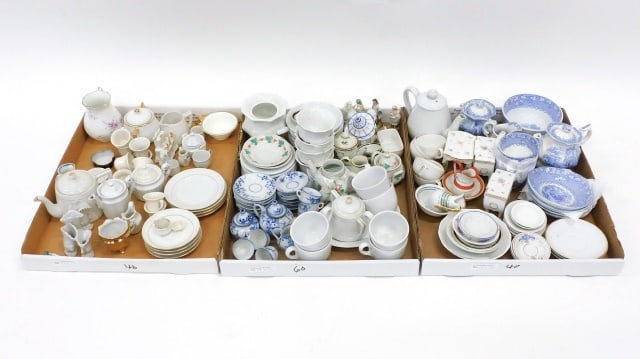 Large Lot of Doll and Miniature China: 19th/20th C. Approximately (140) pieces to include: (2) 19th C. blue transferware doll's tea sets; various white ironstone miniatures and tea sets; figural trinket boxes; unusual soft paste teapot; pi