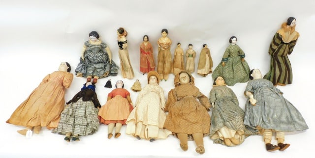 (17) Jenny Lind Antique Dolls: Mid-19th C. To include: (A) Eight larger dolls dressed in clothing from Ca. 1840-1860. Dolls measure 16" to 23" tall. (B) Nine smaller dolls. The second tallest of these dolls wears a Ca. 1850s cotton