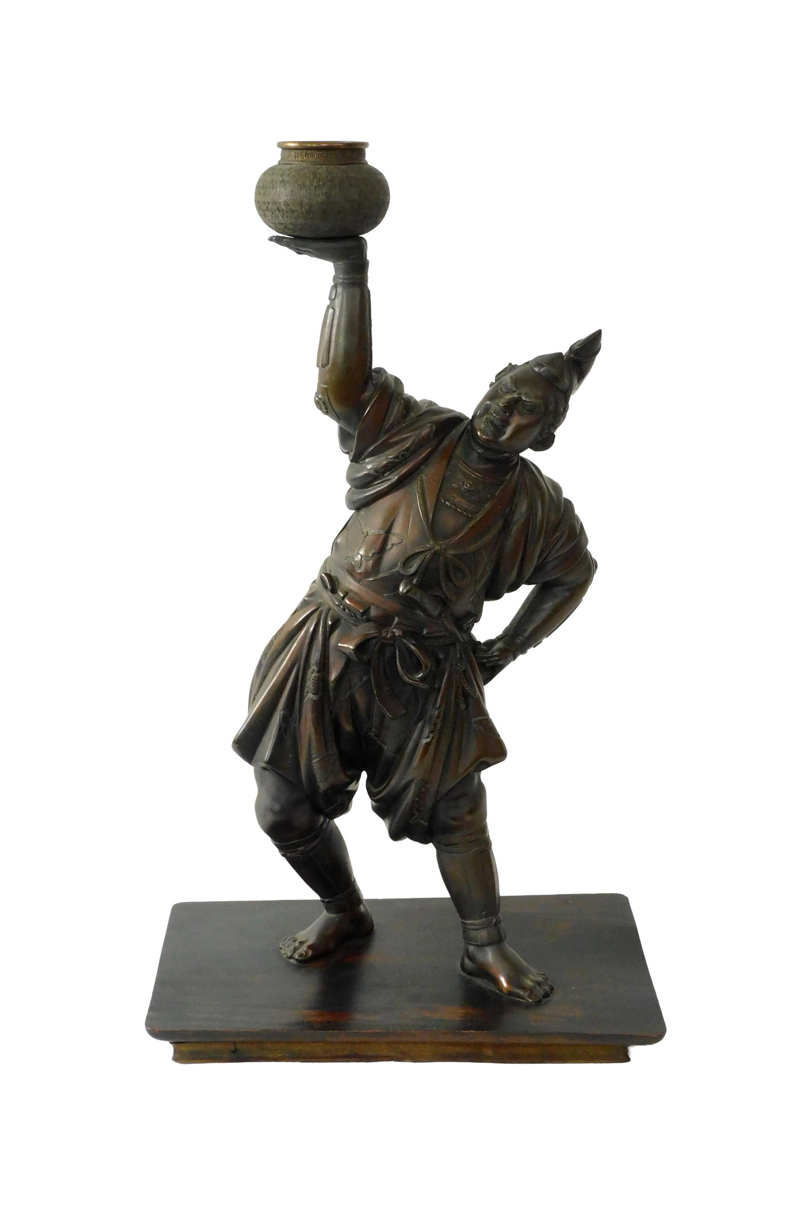 Japanese Meiji Bronze Sculpture: 19th C. Depicts a Samurai warrior with sword and bowl. Possibly a censer. Unsigned. Mounted on a wooden stand. Bronze is 24" high x 8" wide. Stand measures: 1 1/4" high x 14 1/4" wide x 9 1/4" deep. 2