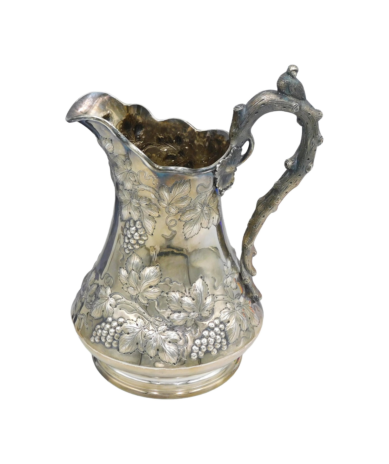 Coin Silver Pitcher: 19th C. Lincoln & Foss, Boston. W&G mark, Woodard and Grosjean, one of America's premier silver designers. Overall embossed grapevine motif. Twisted branch handle with bird. 11" high. 28.65 ozt. Prove