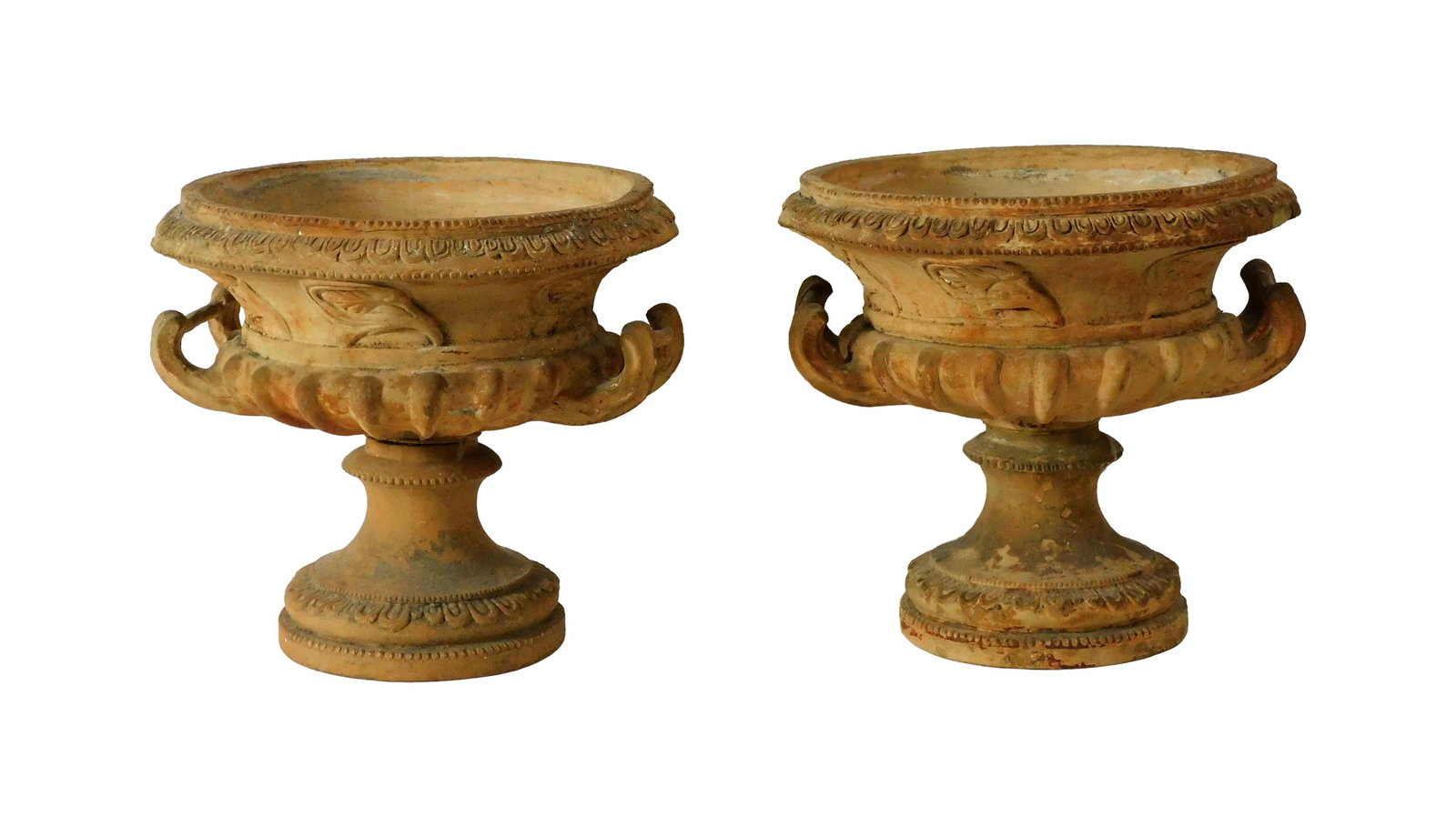 Pair of Terracotta Planters: 19th C. Classical design with handles. 14 1/2" high x 16 1/2" diameter at top. 19.4 lbs. (each). Provenance: From the estate of Alfred J. Walker, legendary art dealer and collector. Founder of Walker-