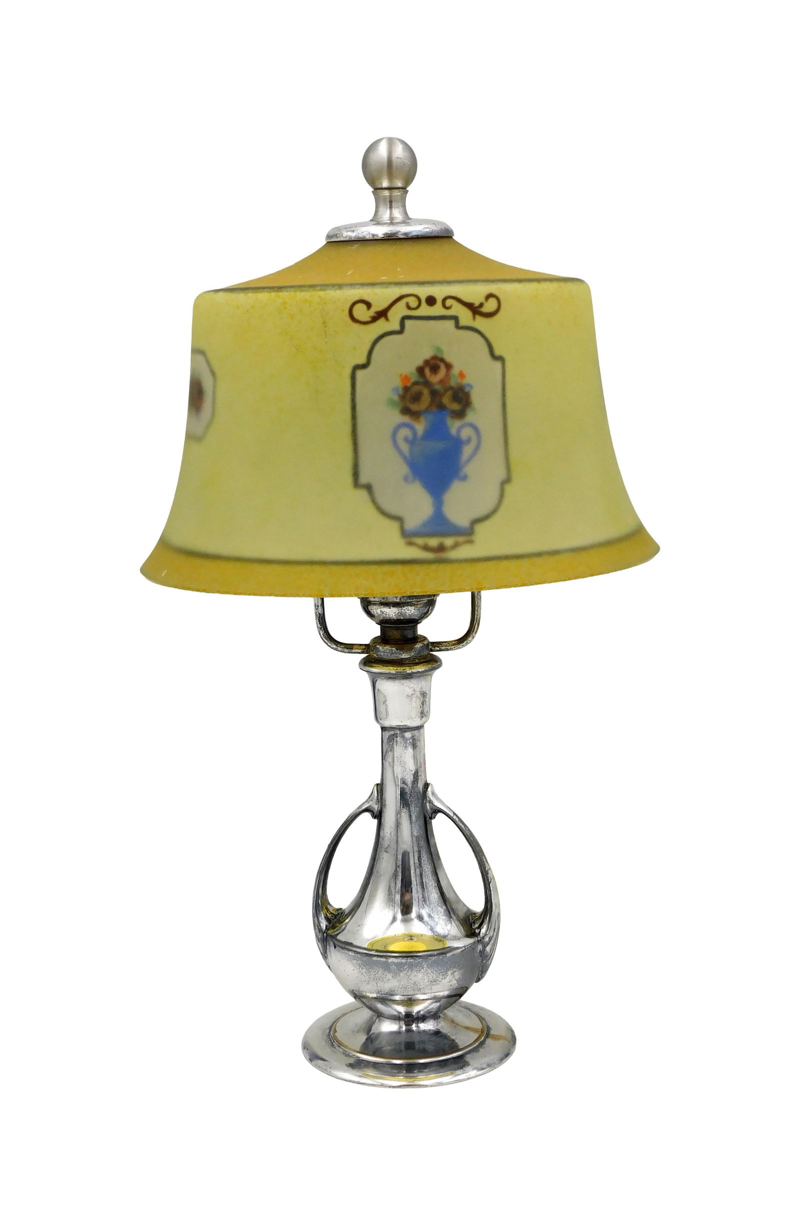 Pairpoint Boudoir Table Lamp: Ca. 1920. Reverse painted shade with urn and floral design. Silverplated base. Base is signed Pairpoint. 15 1/2" high x 8" diameter.Good condition. IMPORTANT- Please note: all items are sold as is, wh