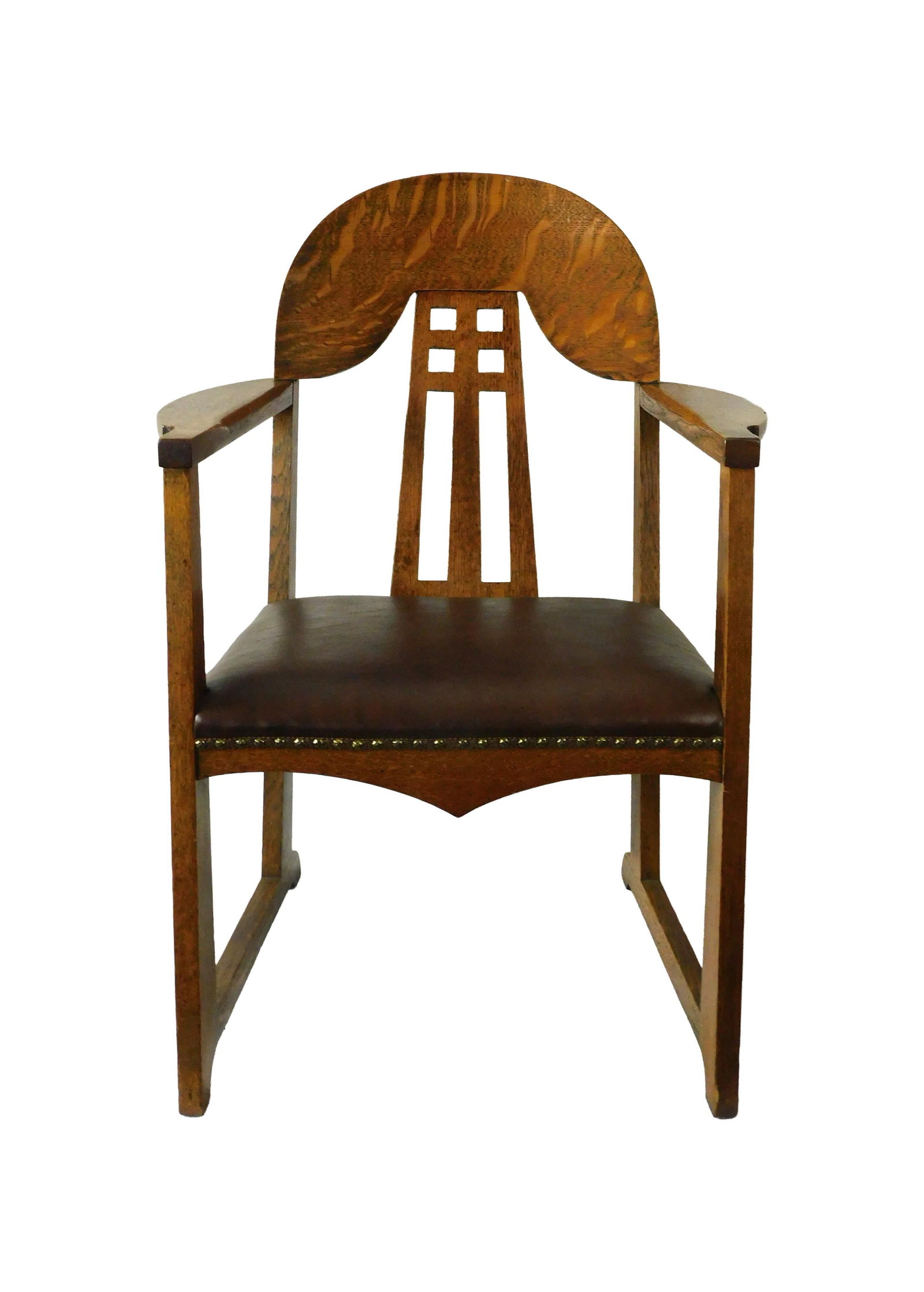 Vienna Secession Jugendstil Oak Armchair: Late 19th/Early 20th C. In the manner of Koloman Moser, Josef Hoffmann. Brown leather upholstered seat. Hand hammered tacks. 36" high x 25 3/4" wide x 19 1/2" deep. 17" seat height. Good condition