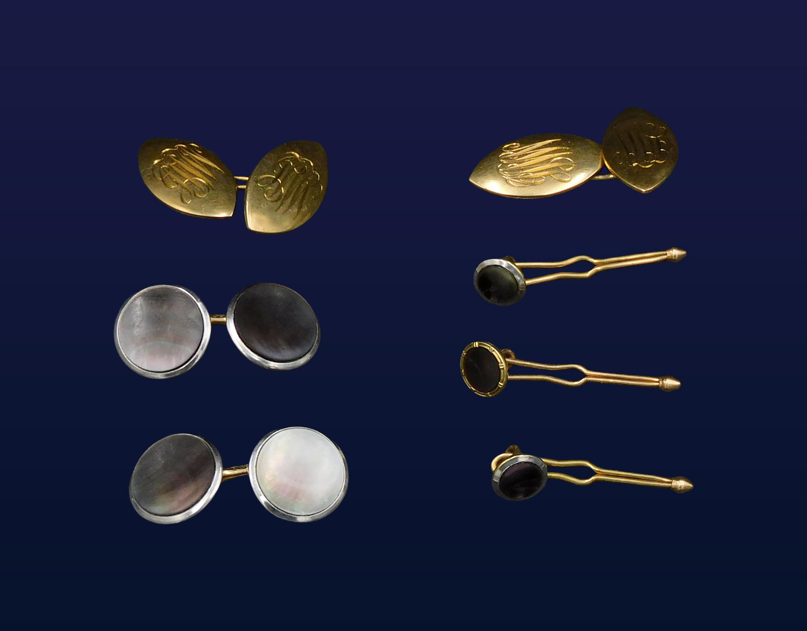 (2) pairs of 14kt Cufflinks and (3) Shirt Studs: One pair is 14kt gold monogrammed and weighs 7.55 grams. The other pair is 14kt gold and matches the shirt studs and has a mother of pearl inlay. The inlaid set weighs 9.19 total grams. Please note