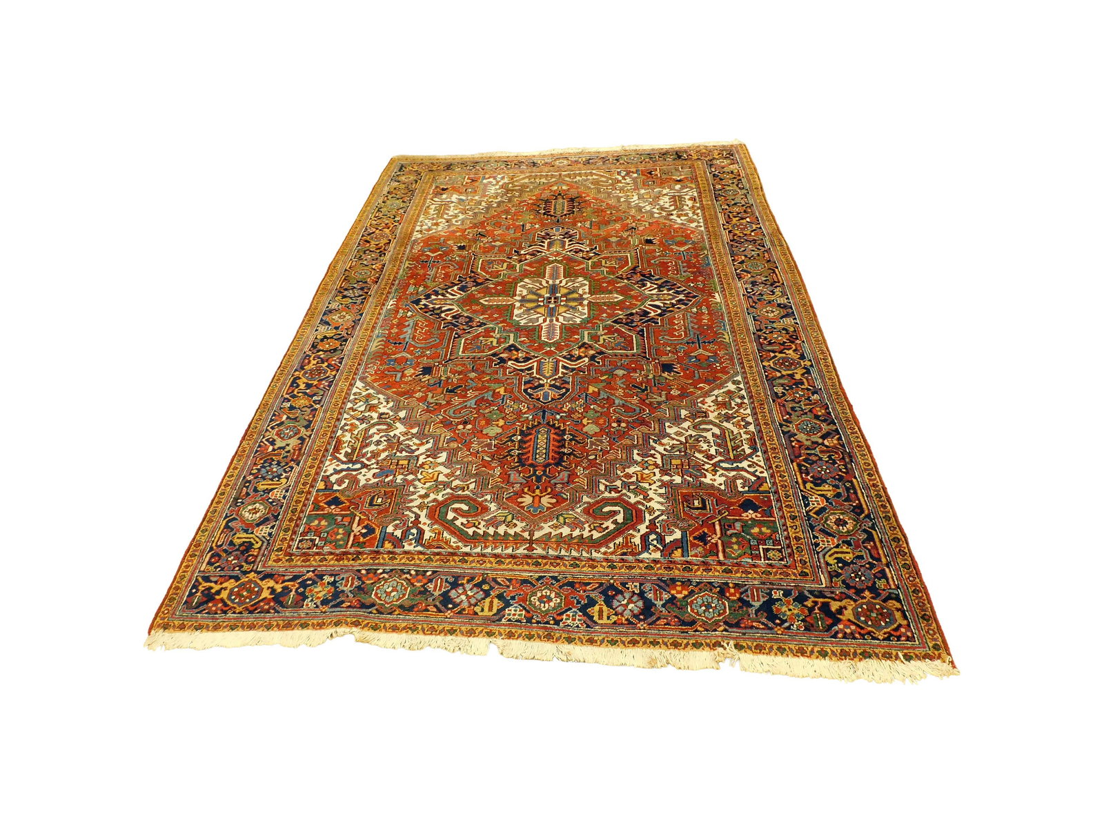 Persian Heriz Rug: Ca. 1920. 11' 6" long x 8' 4" wide.Good condition. No areas of substantial wear. IMPORTANT- Please note: all items are sold as is, where is, with all faults. Marion Antique Auctions encourages all bid