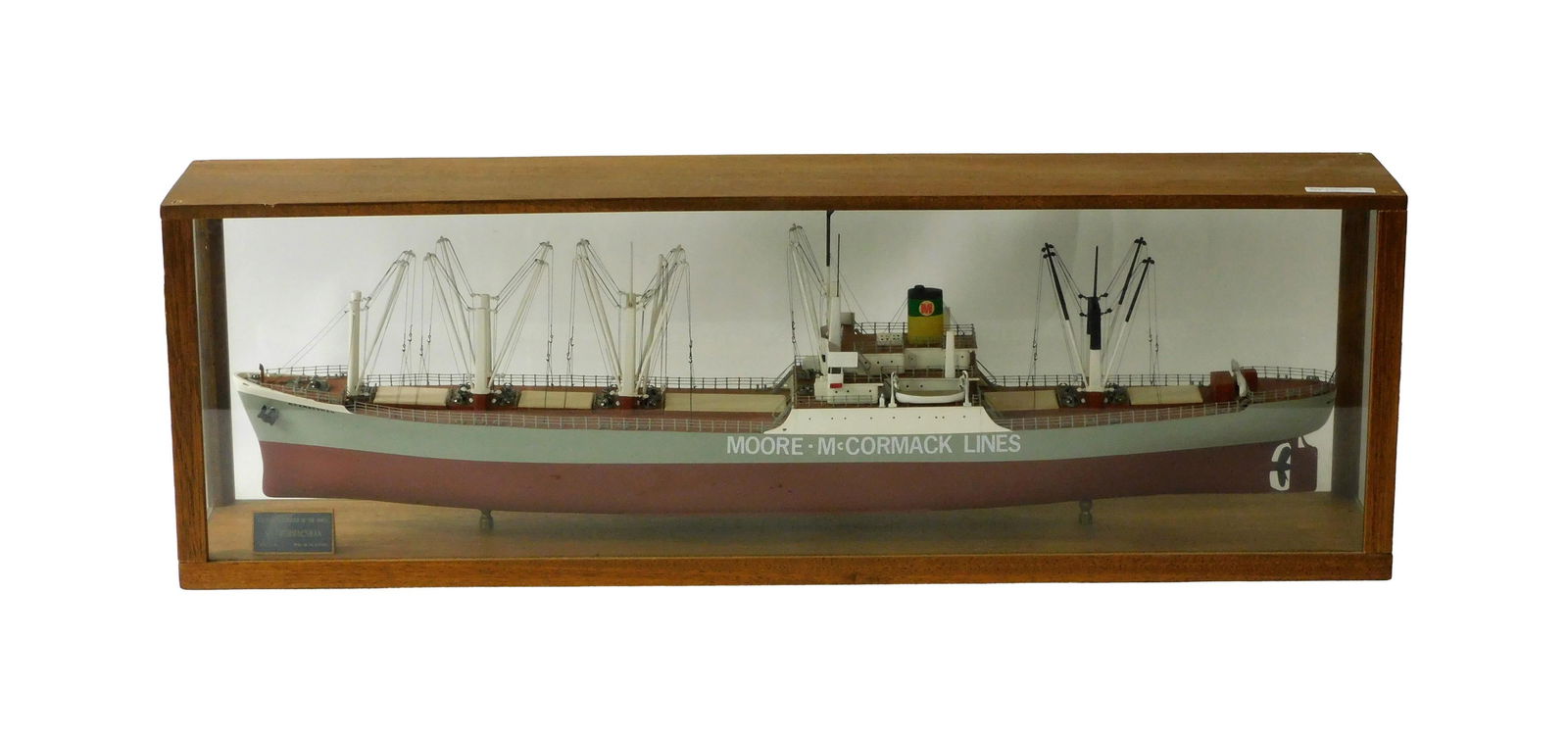 Ship Model of the SS MORMACSWAN: Mid-20th C. Moore-McCormack Lines. In a custom made mahogany and glass case. 10 1/2" high x 31 1/2" wide x 5 3/4" deep.Good condition. Not removed from case. IMPORTANT- Please note: all items are sold