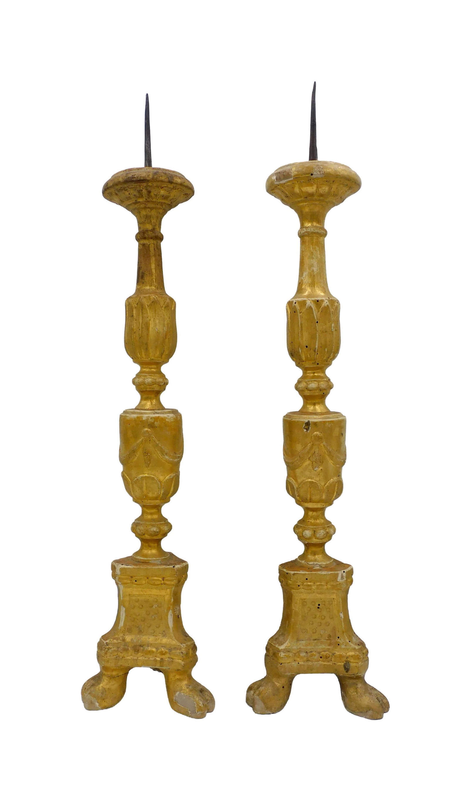 Pair of Spanish-Colonial Prickett Candlesticks: 18th C. Urn and garland design. 24" high x 5" deep. Provenance: From the estate of Alfred J. Walker, legendary art dealer and collector. Founder of Walker-Cunningham Fine Art. Shows loss to gilding, s