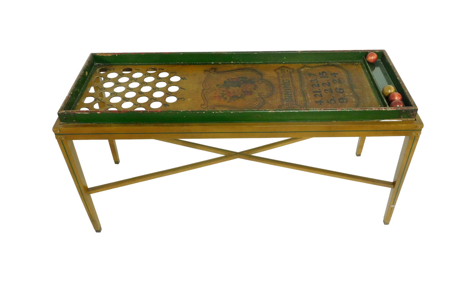 Tabletop Parlor Game: Late 19th C. With slotted numbered interior titled: "Winning Nos.". Painted floral design in center. Winning numbers identified on top. Four rolling balls. In a modern custom made fitted base. 29"