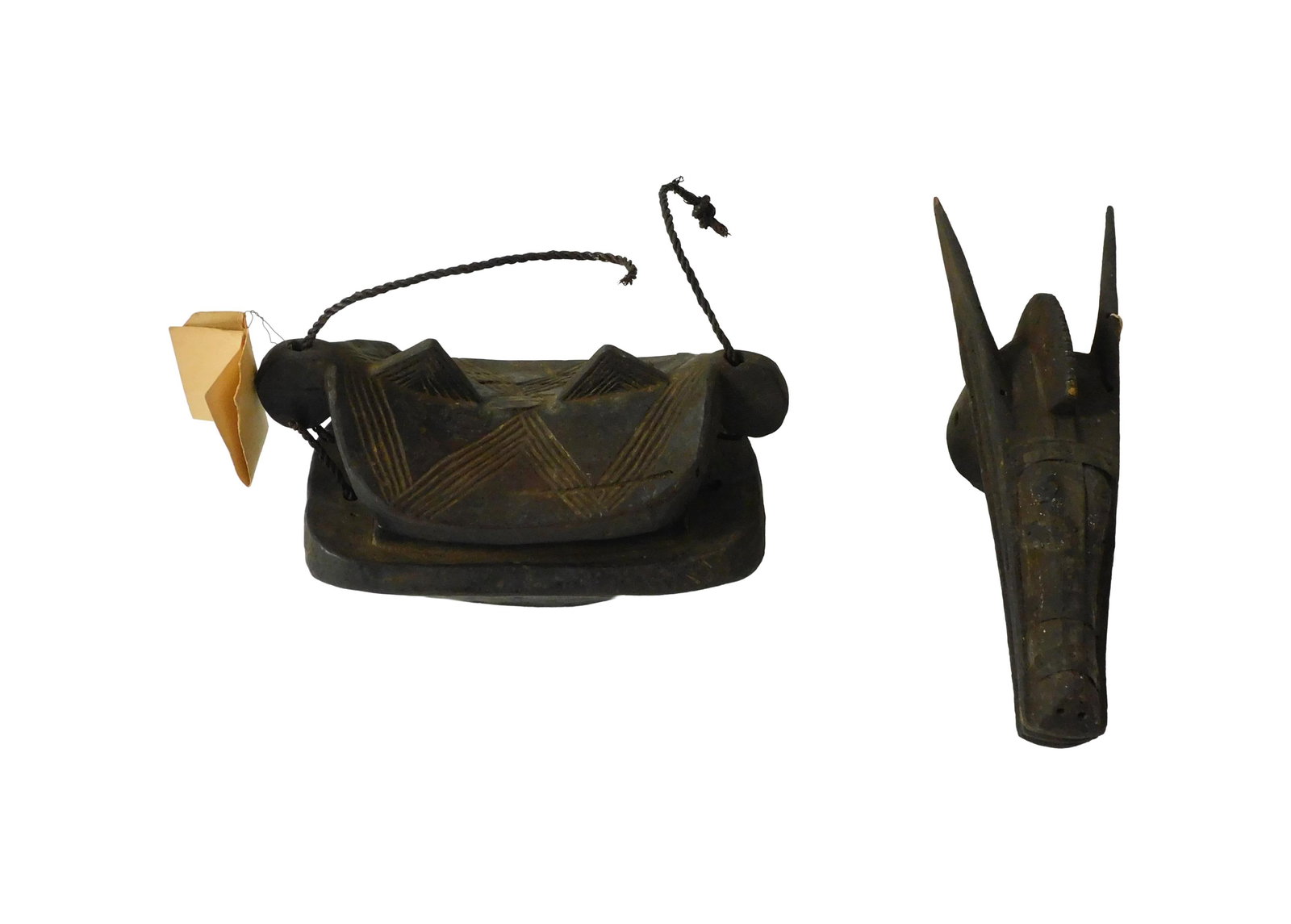African Mask and Food Box: Probably 19th/Early 20th C. To include: (A) Bambara mask of carved wood with metal trim. 6" high x 13" wide x 4" deep. (B) Idoma food box made of carved wood. Lidded top. 6" high x 11" wide x 5" deep.