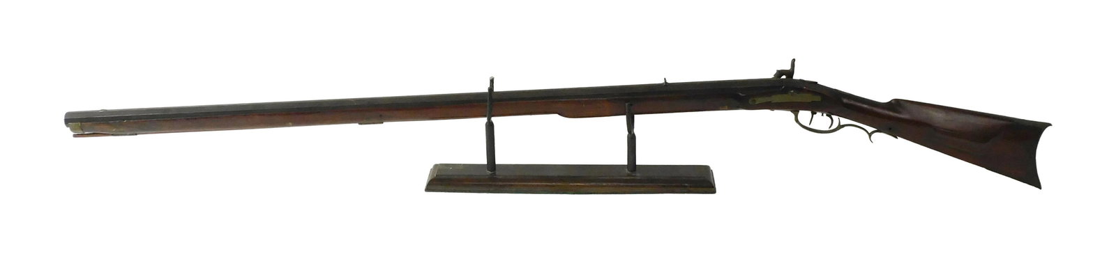 Kentucky Rifle: 19th C. Octagonal rifled barrel. Original engraved patch box. Unsigned. 56" long. Replaced side lock. Minor restorations. Trigger guard is loose. IMPORTANT- Please note: all items are sold as is,