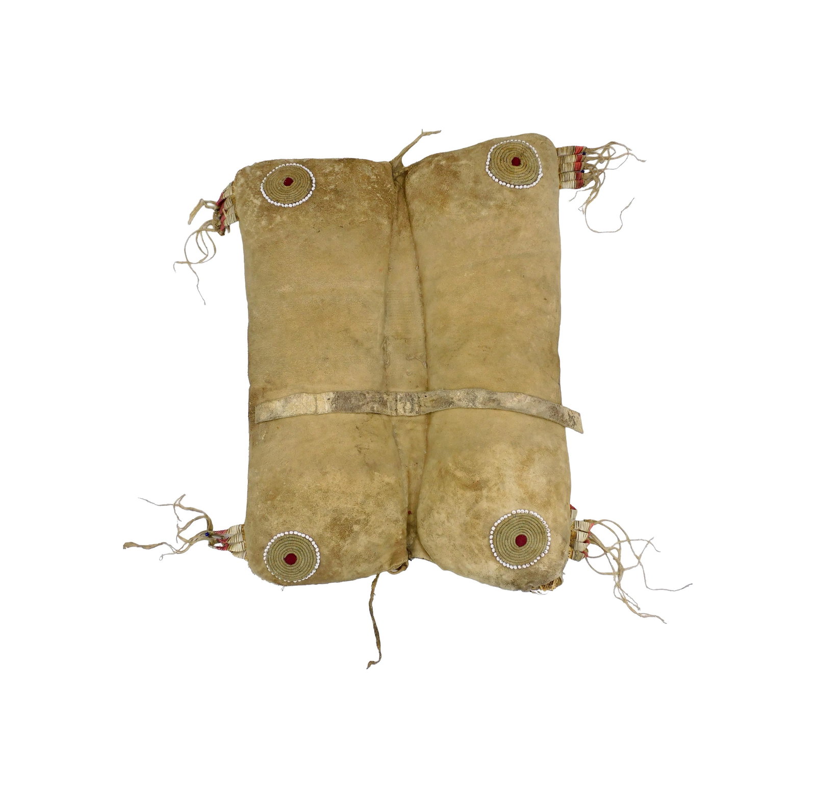 Plateau Saddle Pad: 19th C. Corn husk stuffed. Beadwork and quill fringe. 20" long x 24" wide including fringe. Shows wear consistent with age and use. IMPORTANT- Please note: all items are sold as is, where is, with all