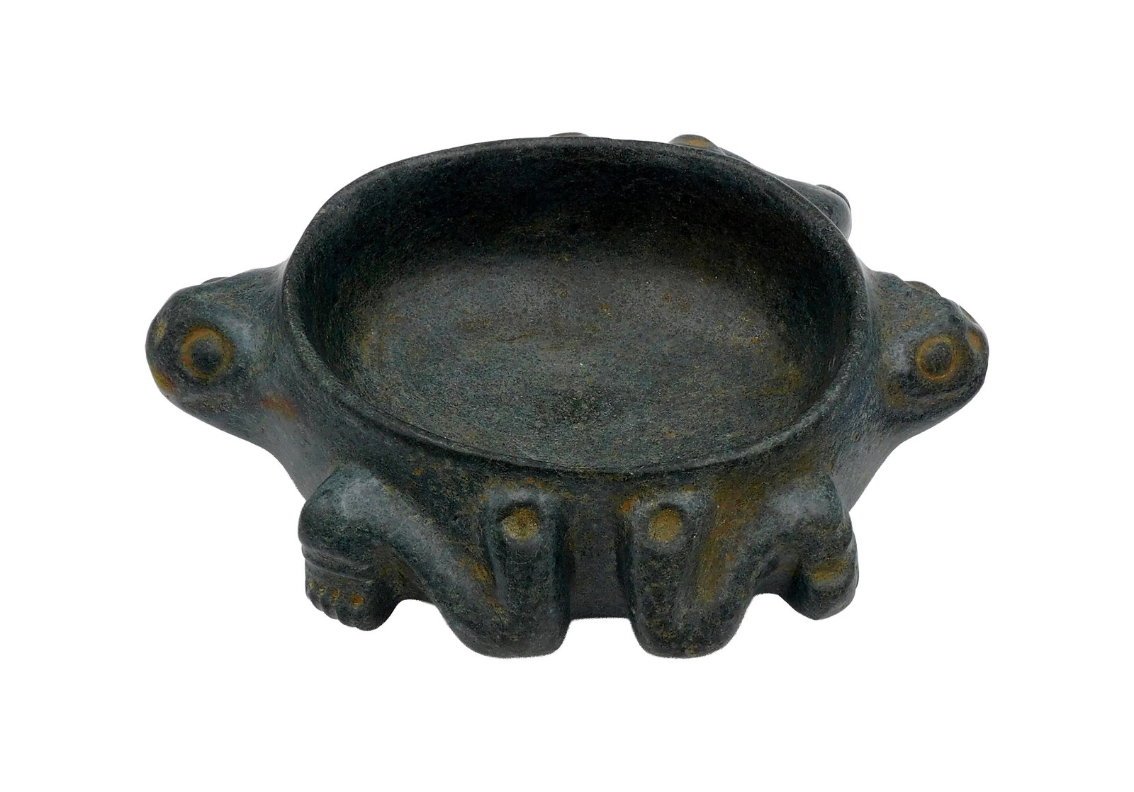 Taino Two Headed Turtle Bowl: Ca. 600-1500 AD. Dominican Republic. Made of a dark green stone. The twin representations likely reference duality, the belief of dual opposites like earth/sky and man/woman. The heads are relief