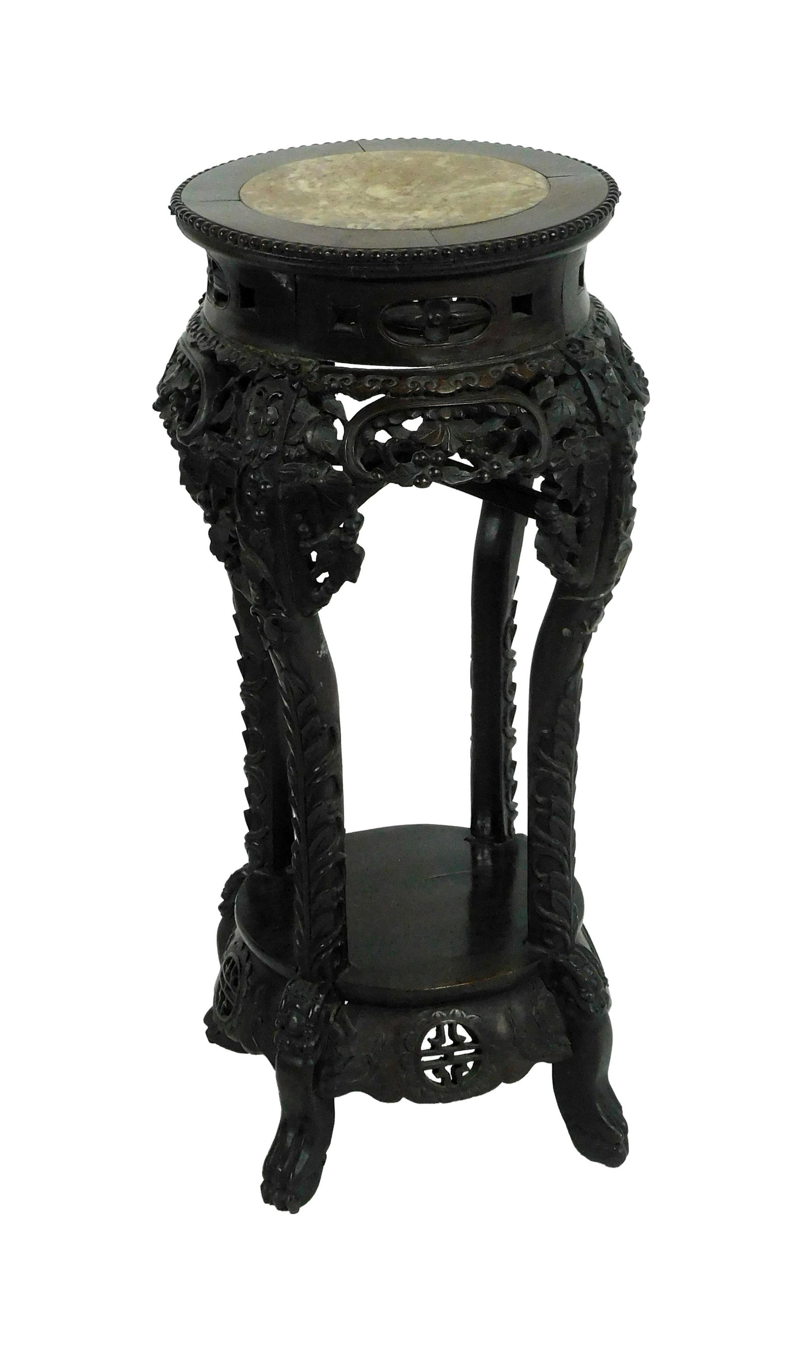 Chinese Rosewood Stand: 19th C. Heavily carved skirt, legs and base. Circular top with pink marble insert. 31 1/2" high x 13 1/2" diameter. Provenance: From the estate of Alfred J. Walker, legendary art dealer and collector.