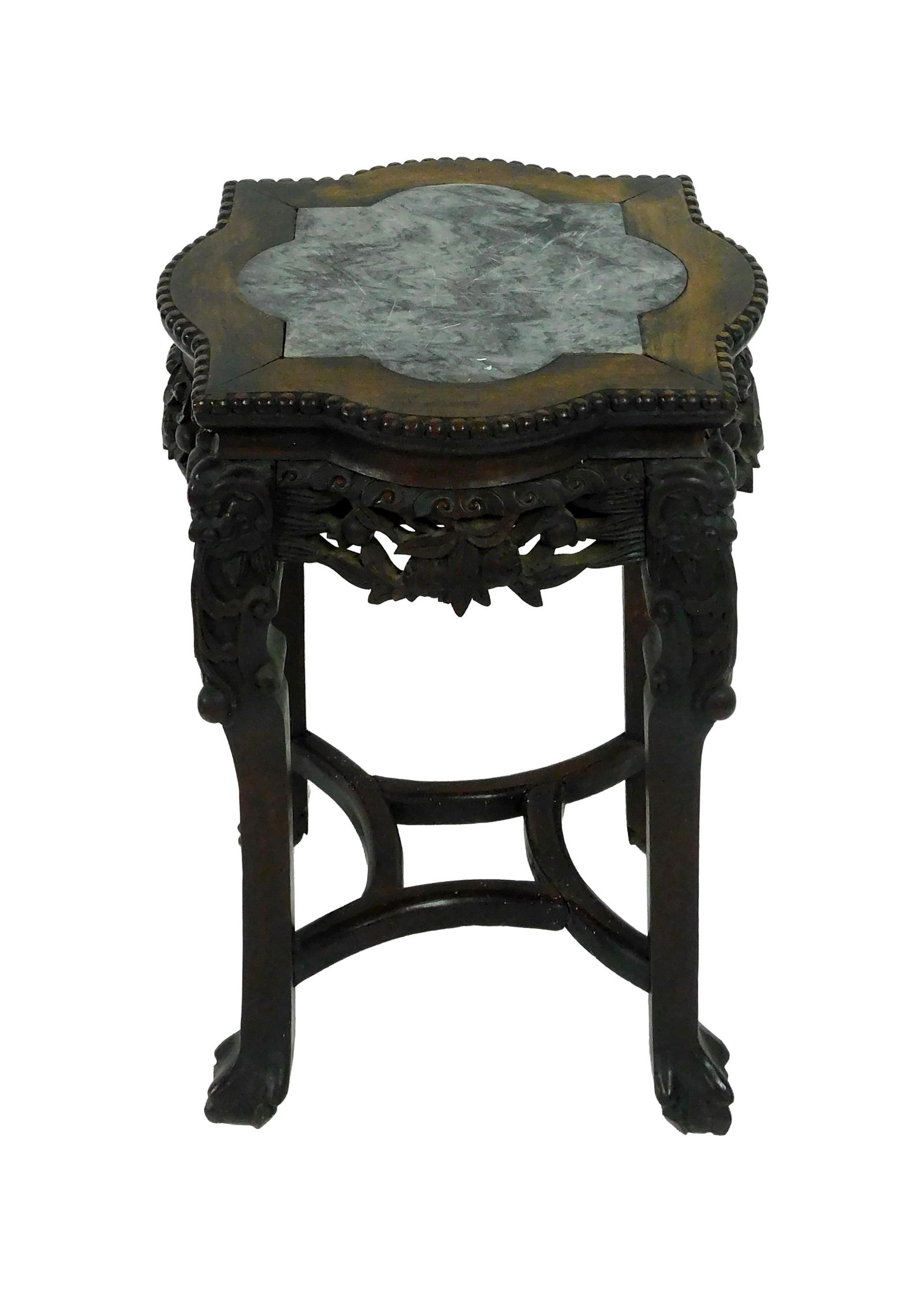 Chinese Teakwood Stand: 19th C. Heavily carved base with animal feet. Scalloped shaped top with gray marble inset. 23" high x 15 1/2" square at top. Provenance: From the estate of Alfred J. Walker, legendary art dealer and c