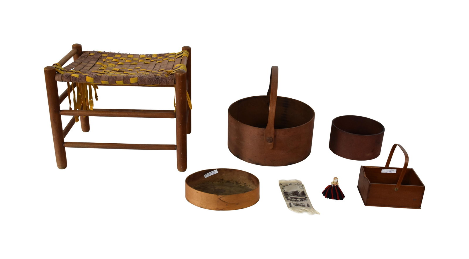 (7) Shaker Items: 19th C. To include: (A) Maple stool with as-is tape seat. 14" high x 17" wide x 13" deep. (B) Dovetailed swing handled carrier. Oak and cherry. 6 1/2" high x 6 1/4" wide x 4 1/2" deep. (C) Pen wipe