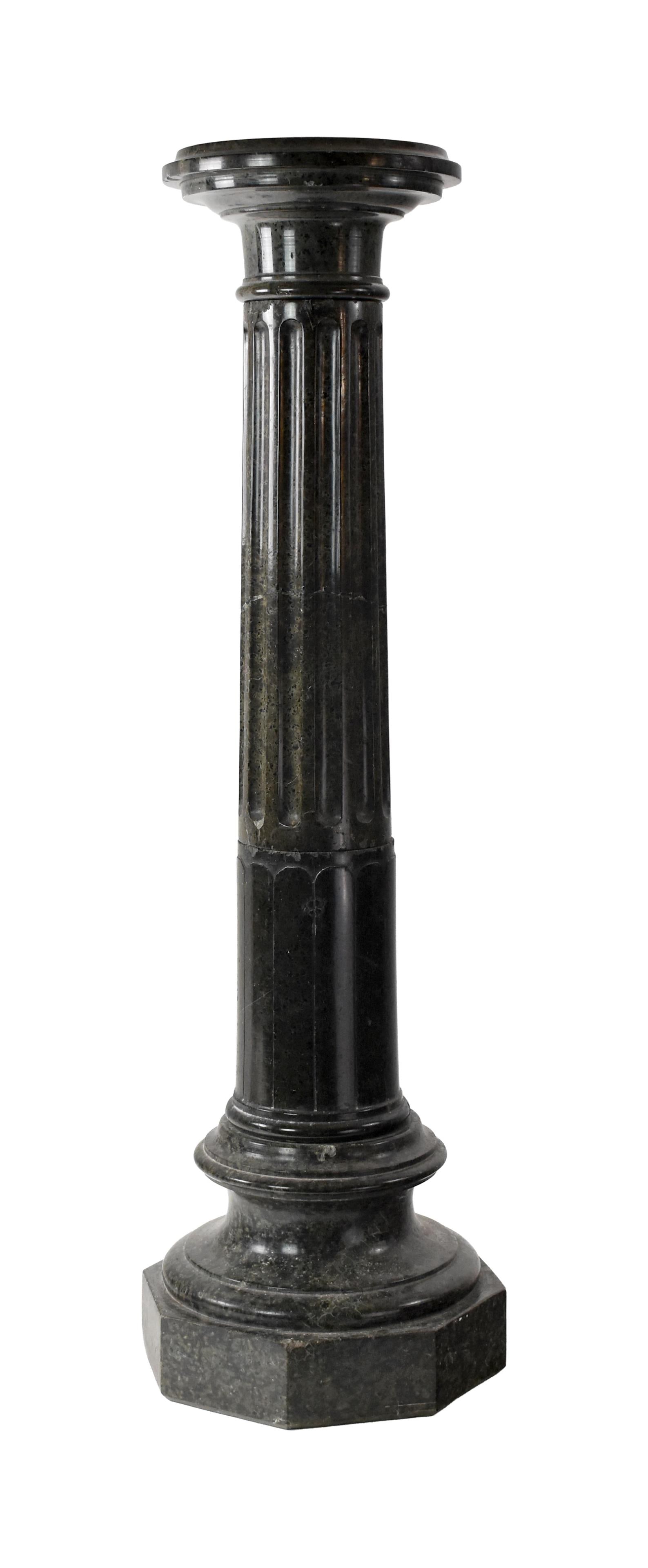 Green Marble Pedestal: 19th C. In four parts. Reeded central column sitting on an octagonal base. Circular revolving top. 42" high x 13" octagonal base. Provenance: Estate of Alfred J. Walker, legendary art dealer and
