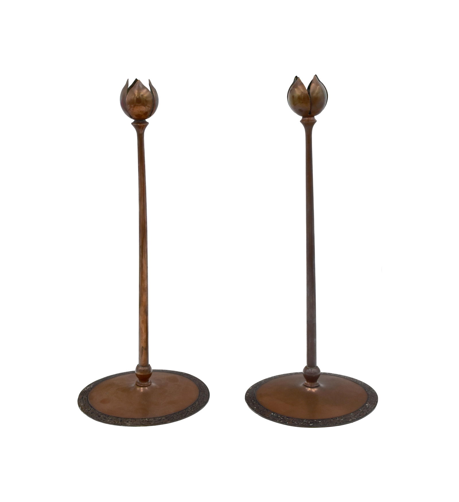 Pair of Heinz Art Metal Candlesticks: Early 20th C. Copper with applied sterling silver trim on base. Petal form. 14 1/2" high x 6" diameter. Provenance: Estate of Alfred J. Walker, legendary art dealer and collector. Founder of