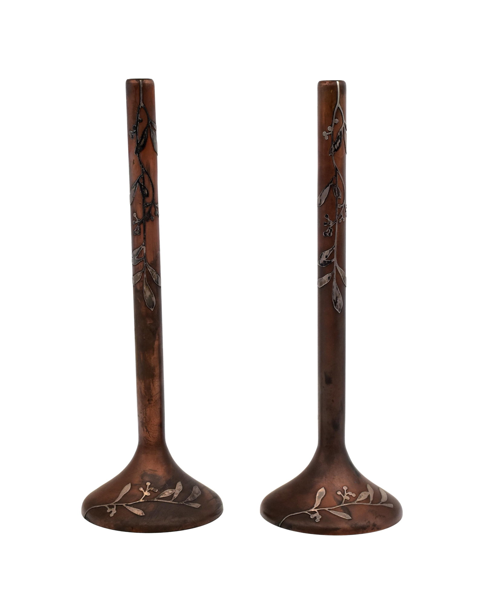 Pair of Heinz Art Metal Candlesticks: Early 20th C. Bronze with sterling silver overlay trim. 11 1/2" high x 4" diameter at base.Good condition consistent with age. IMPORTANT- Please note: all items are sold as is, where is, with all