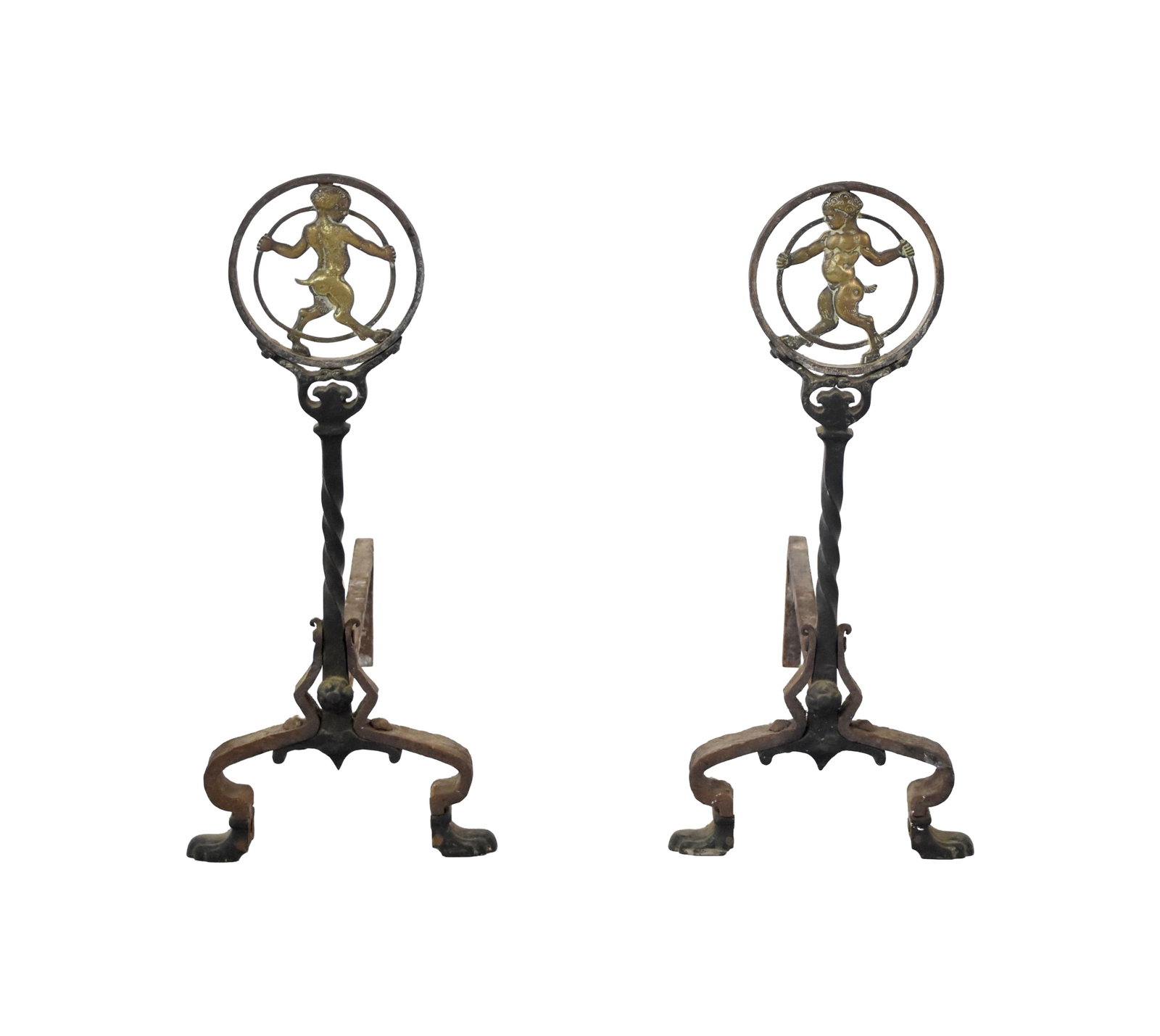 Pair of Arts & Crafts Andirons: Early 20th C. Heavy cast iron with circular bronze insert depicting a therianthrope figure. 23 3/4" high x 10" wide x 19" deep. Approx. 13 lbs. each. Provenance: Estate of Alfred J. Walker, legendary