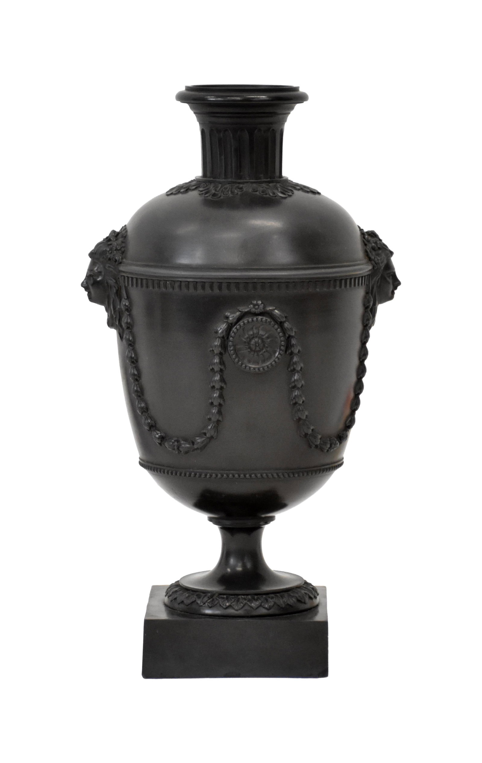 Wedgwood Black Basalt Urn: Late 18th/Early 19th C. Classical motif with female face handles. Signed "H. Palmer & Hanley". 13" high x 7" wide.No cover. Minor chipping to corners of the base. IMPORTANT- Please note: all items