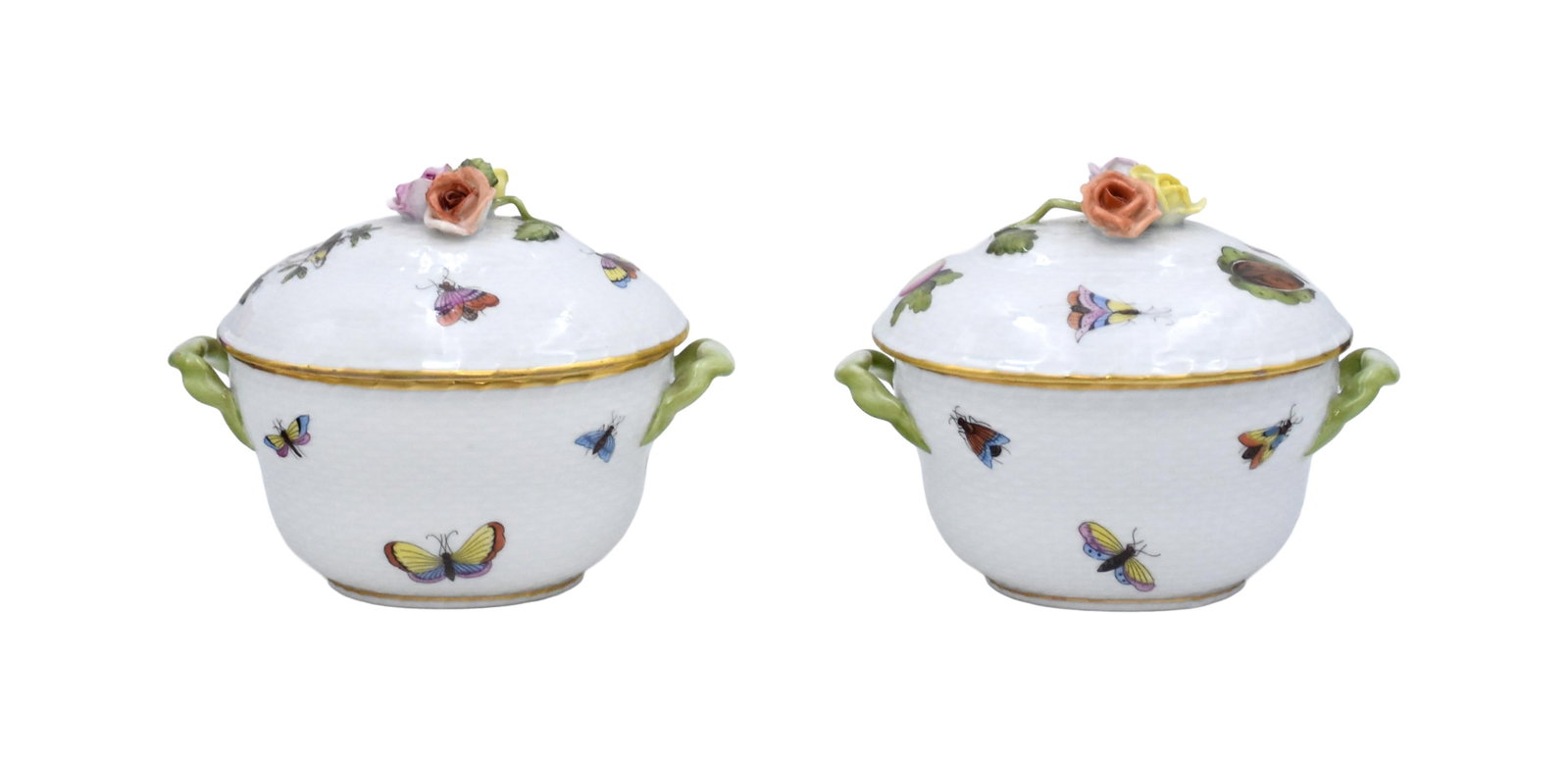 Pair of Herend Covered Porcelain Dishes: 20th C. Rothschild pattern. Molded basketweave body, gilt rim, green branch-form handles, and applied floral finial to lid. 4 1/2" high x 5 1/4" wide x 3 3/4" wide. Good condition consistent with age 