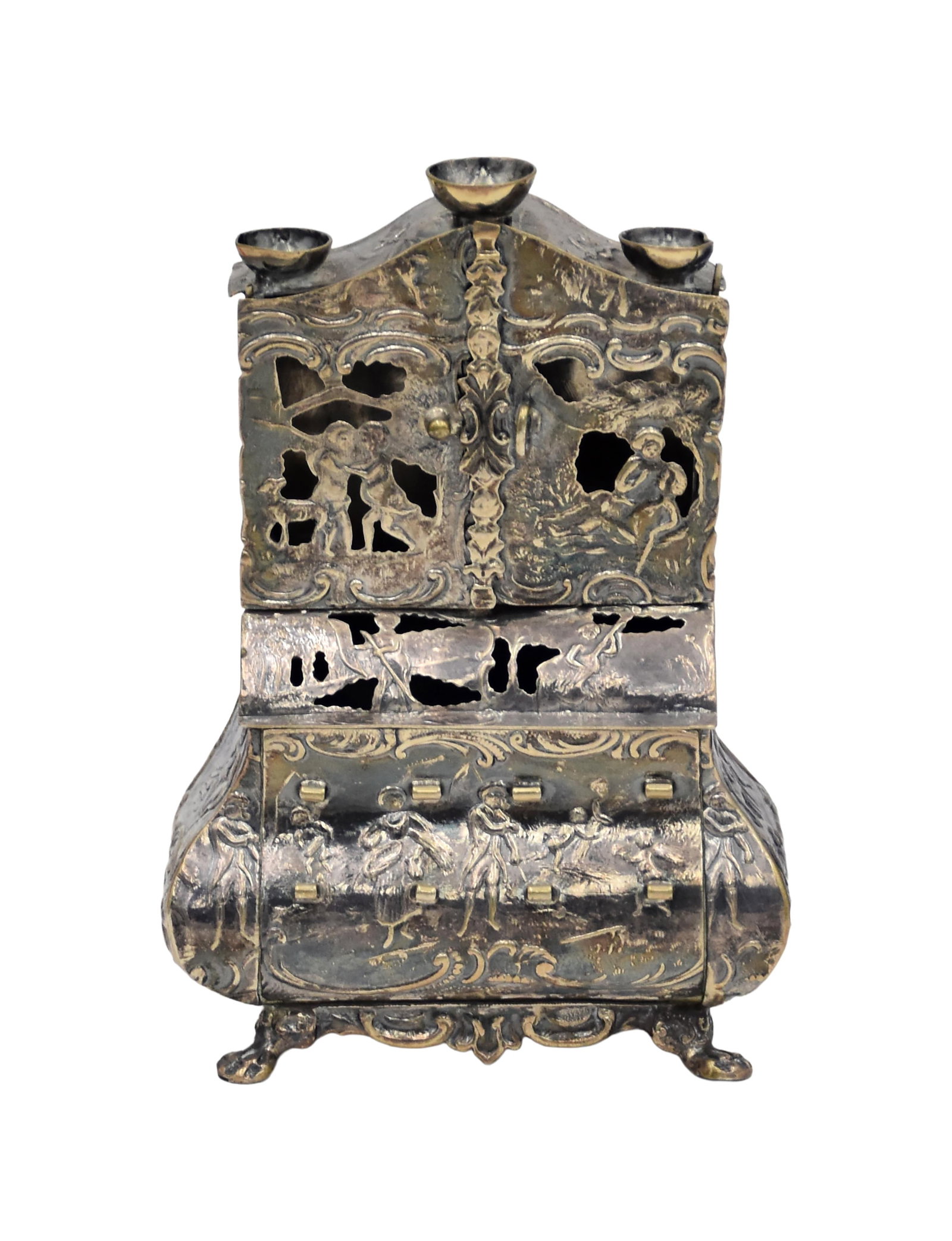 Sterling Silver Miniature Cabinet: Late 19th/Early 20th C. Dutch. Embossed with figural, foliate, and scroll decoration. Shape bombe lower case and pierced upper cabinet. One opening door. Cabriole legs. 4 1/4" high x 3" wide x 1 3/4"