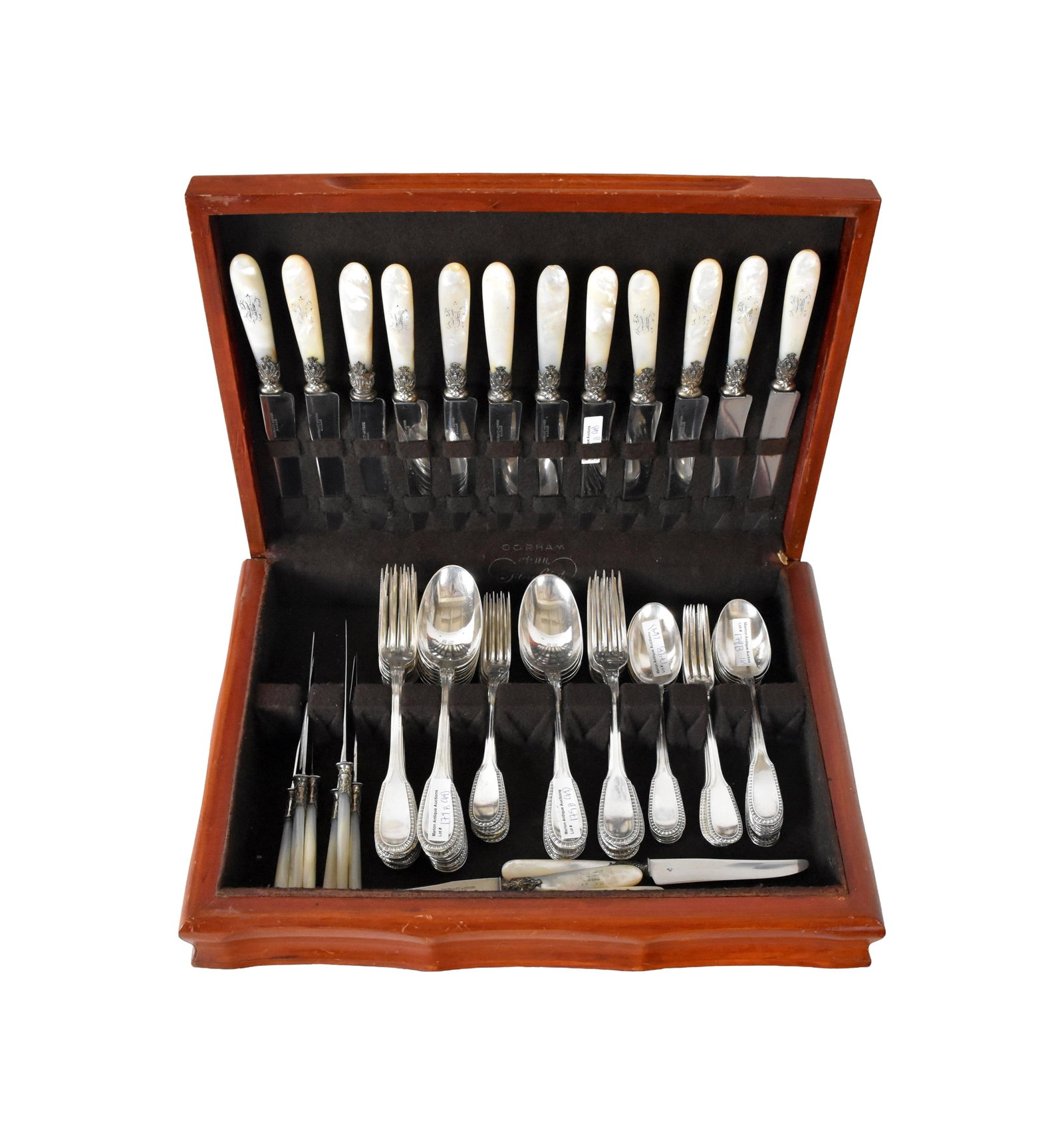 (69) Piece French Silver Flatware Set: 19th/Early 20th C. Henin & Cie maker. 950 grade. Simple beaded edged design. To include: (A) Twelve forks. 8 1/2" long. (B) Twelve spoons. 8 1/2" long. (C) Eleven forks. 7 1/8" long. (D) Twelve
