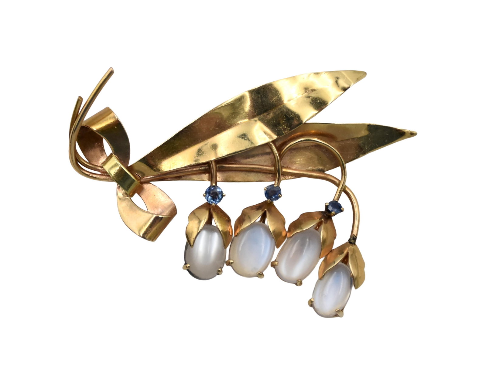 Vintage Gold Ceylon Moonstone Brooch: 14kt. Lily of the Valley form. Cornflower blue sapphire accents. 2 1/2" long. 7.1 total grams. One sapphire accent missing. IMPORTANT- Please note: all items are sold as is, where is, with all