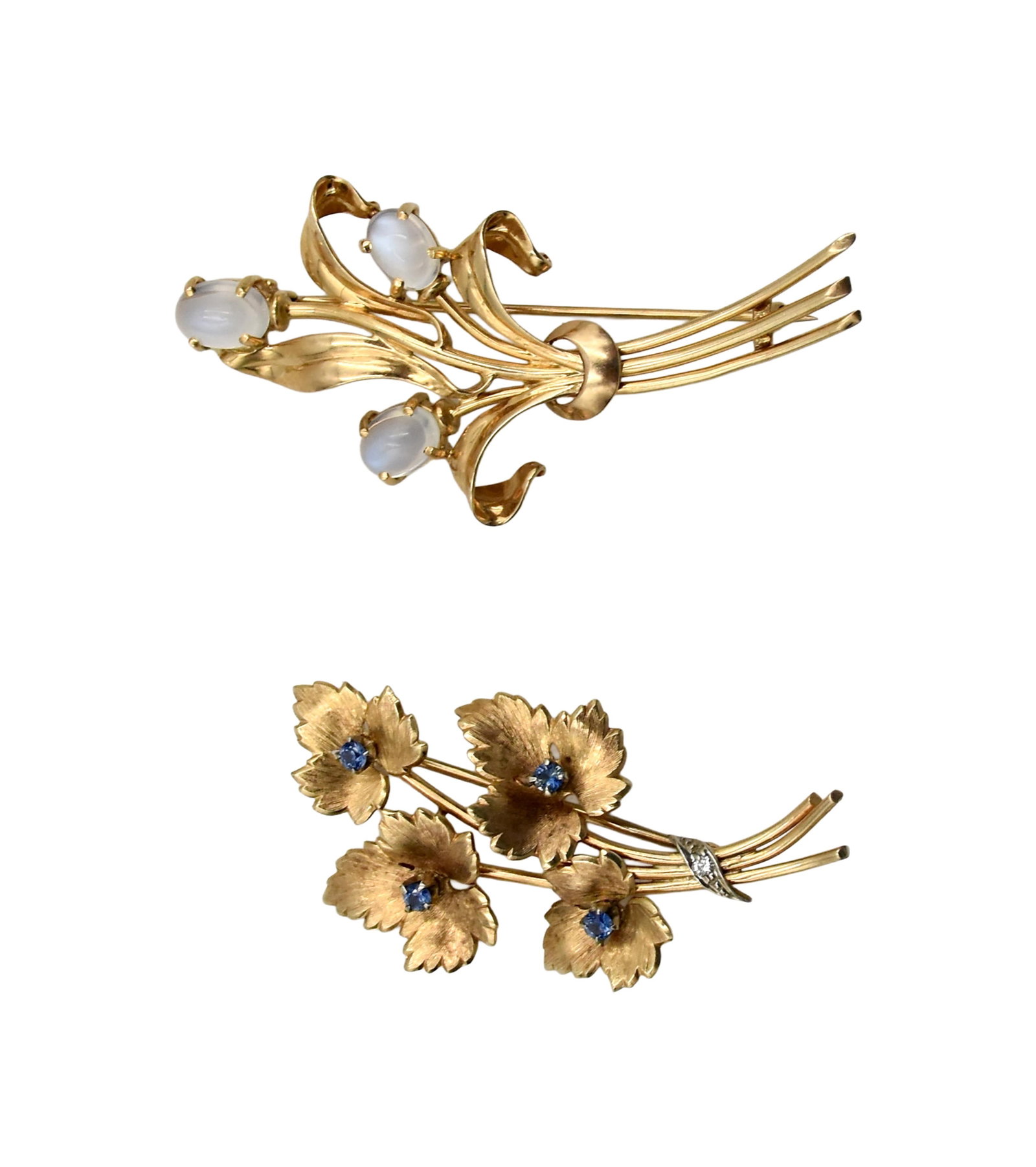 (2) Vintage Gold and Gemstone Brooches: 14kt yellow gold. To include: (A) Lily leaf-form brooch set with three Ceylon blue moonstones. Marked 14kt. 6 cm wide. 8.33 grams. (B) Multi-maple leaf form brooch set with small sapphires and