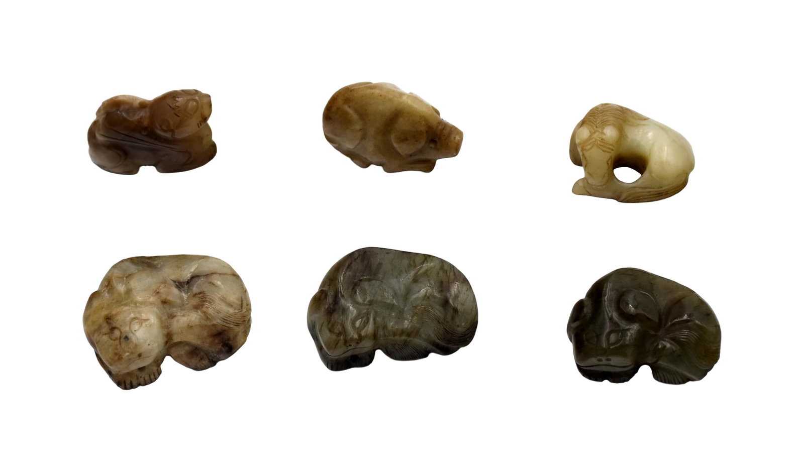 (6) Carved Jade Animal Figures: Late 19th/Early 20th C. Possibly Chinese netsukes. Includes a tiger, horse, pig and others. All approximately 2" high x 1 1/2" wide. In a custom fitted case with silk lining measuring: 2 1/2" high x 9